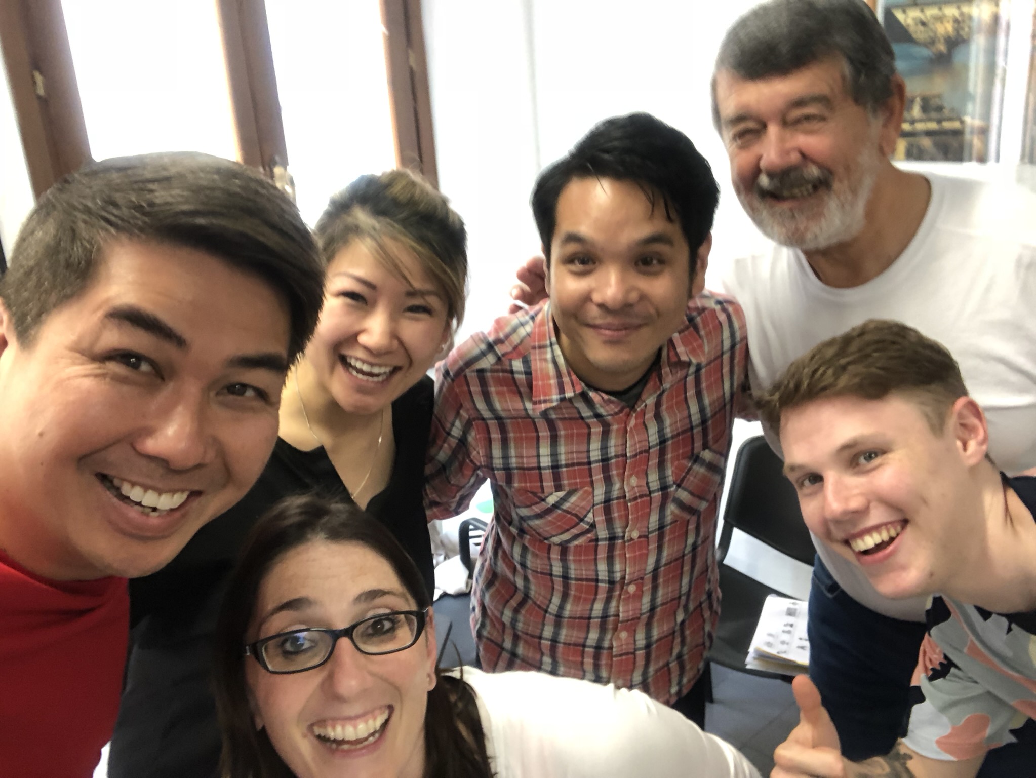 A lively classroom selfie with classmates